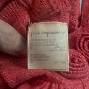 First Impressions Coral Knit Baby Sweater and long sleeve sweater onesie.